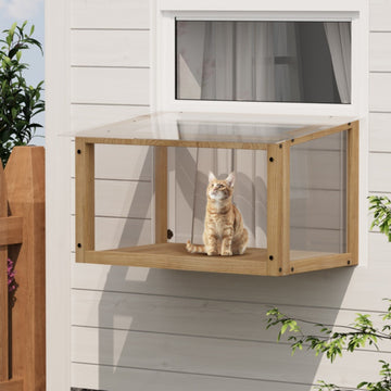 Cat sitting on a wooden cat shelf attached to a house exterior.